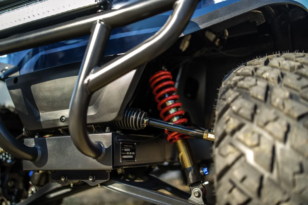 Coil-over suspension on a Denago golf cart